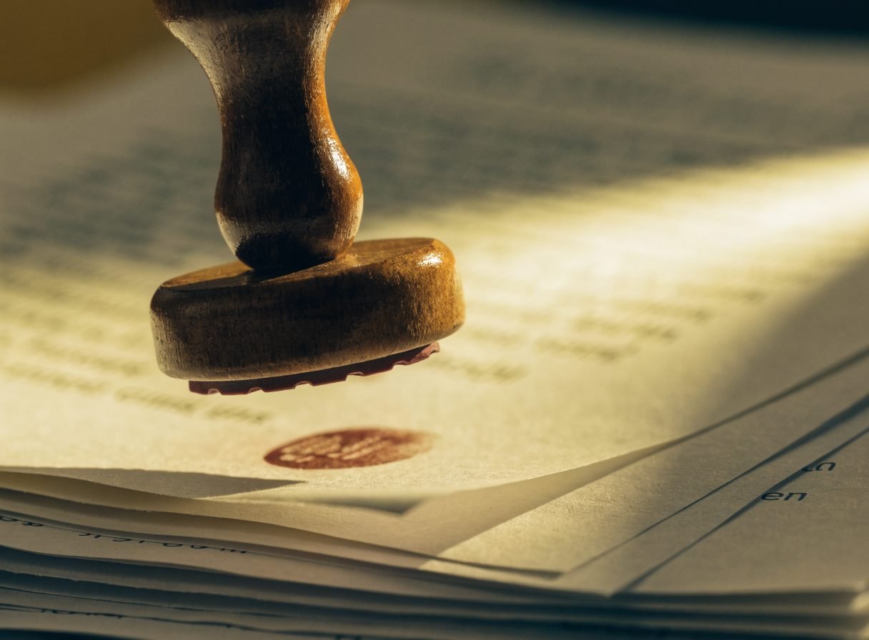 Documents being stamped for approval